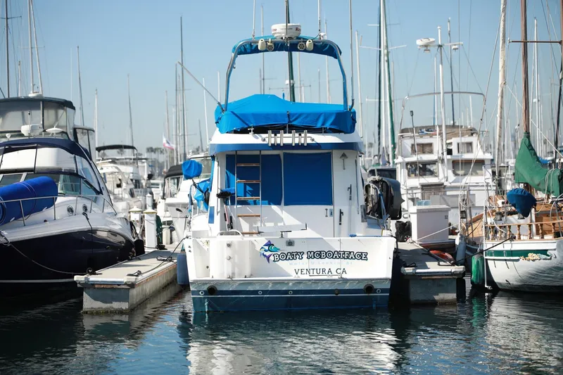 Slide: The Image of 1988 Mediterranean 38 Convertible boat docked in marina, Ventura, CA. - 2