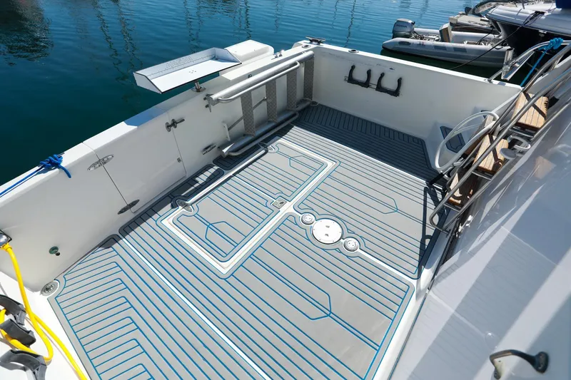 Slide: The Image of 1988 Mediterranean 38 Convertible boat deck with modern fittings and sleek design. - 23