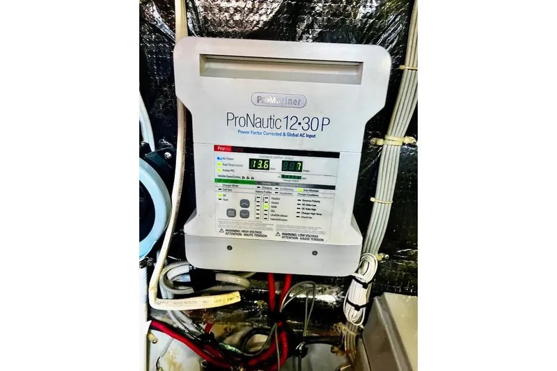 Slide: The Image of ProNautic 12:30P power converter in 1988 Mediterranean 38 Convertible boat. - 58