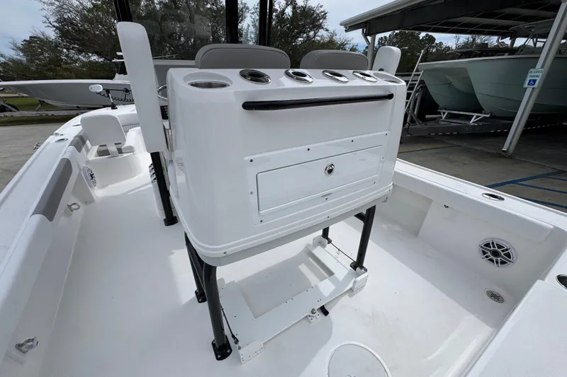 Slide: The Image of 2026 Caymas 26 HB boat interior with seating and storage compartments. - 36