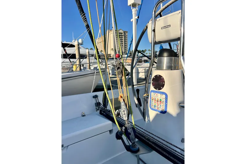 Slide: The Image of 2003 J Boats J/109 sailboat cockpit with rigging and navigation equipment. - 51