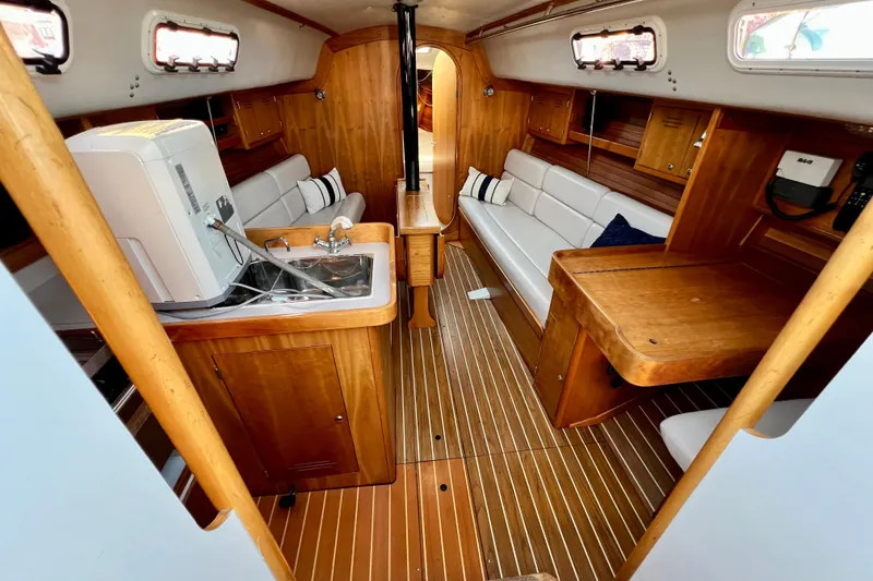 Slide: The Image of Interior of 2003 J Boats J/109 sailboat with wood finish and modern amenities. - 54