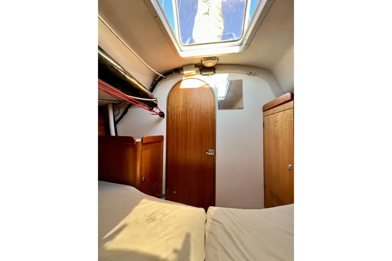 Slide: The Image of Interior cabin of 2003 J Boats J/109 sailboat with wooden door and skylight. - 72