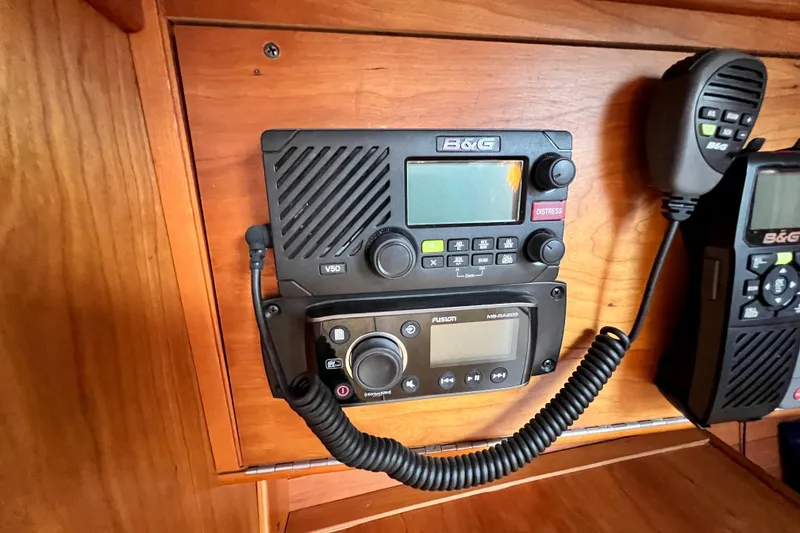 Slide: The Image of VHF radio and control panel on 2003 J Boats J/109 yacht interior. - 83