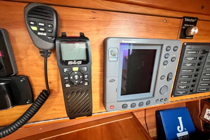 Slide: The Image of Control panel of a 2003 J Boats J/109 with B&G and Raymarine equipment. - 84