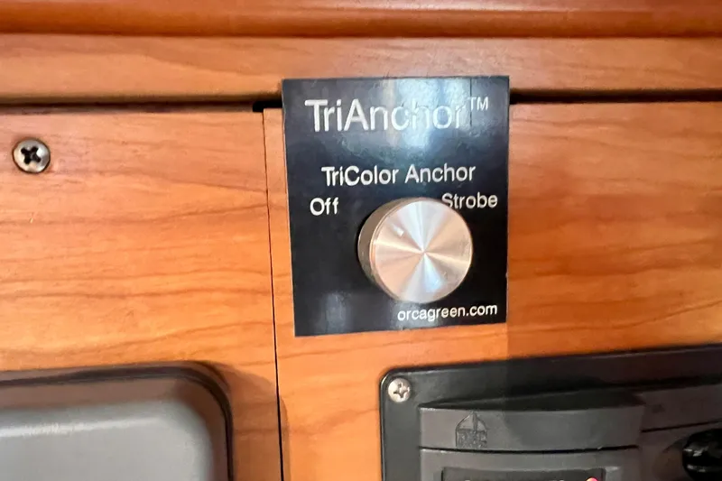 Slide: The Image of TriAnchor control panel on 2003 J Boats J/109, featuring tricolor anchor light settings. - 86