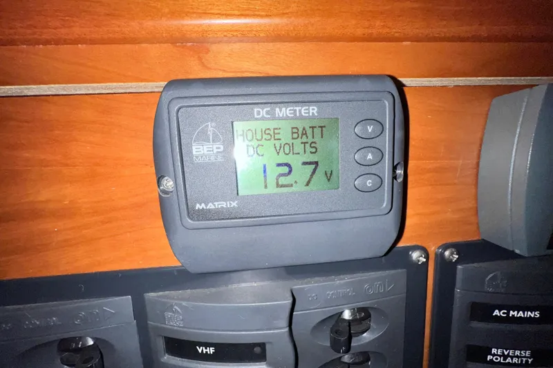 Slide: The Image of DC meter displaying 12.7 volts on a 2003 J Boats J/109 yacht. - 87