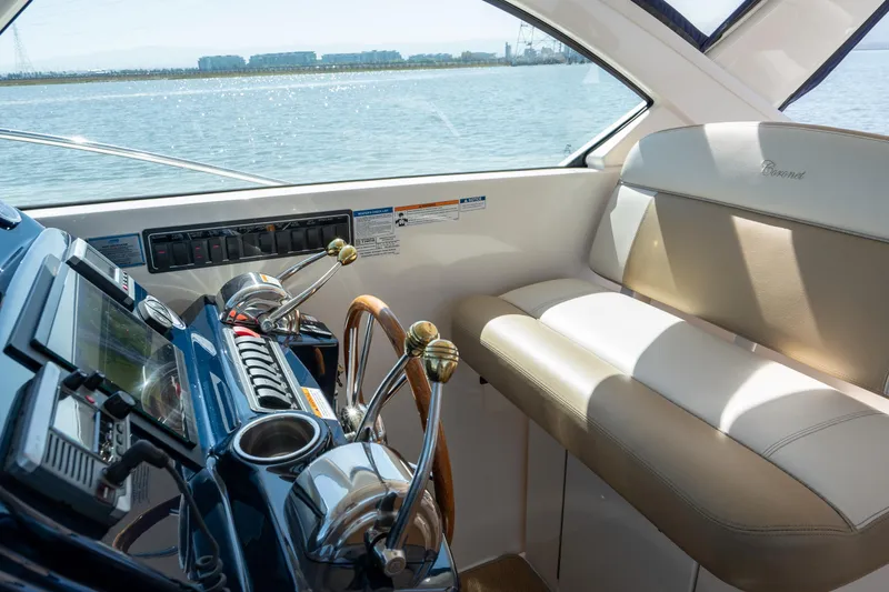 Slide: The Image of Interior of 2012 Tiara Yachts 3100 Coronet with helm console. - 13