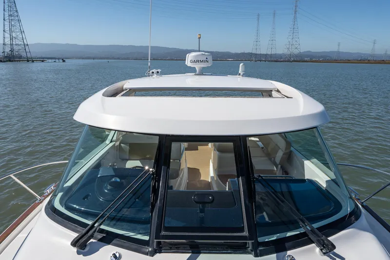 Slide: The Image of 2012 Tiara Yachts 3100 Coronet on calm waters. - 24