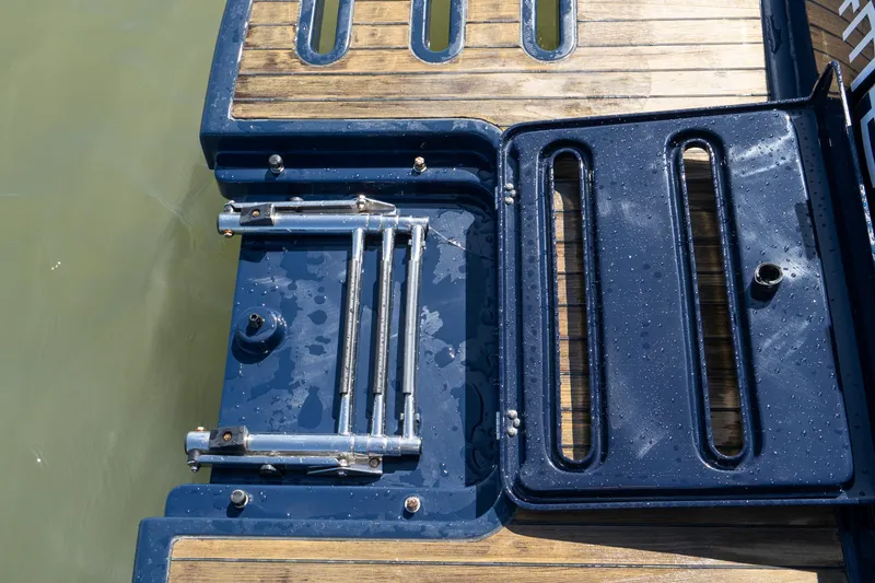 Slide: The Image of Tiara Yachts 3100 Coronet 2012 swim platform with folding ladder. - 31