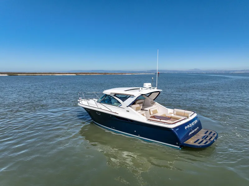 Slide: The Image of 2012 Tiara Yachts 3100 Coronet on calm waters. - 35