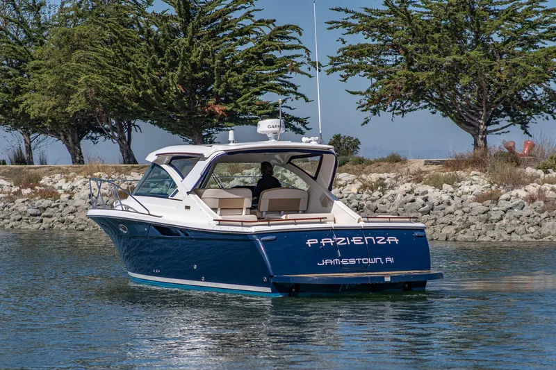 Slide: The Image of 2012 Tiara Yachts 3100 Coronet on calm waters. - 5