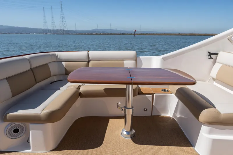 Slide: The Image of Interior of 2012 Tiara Yachts 3100 Coronet with seating and table. - 9