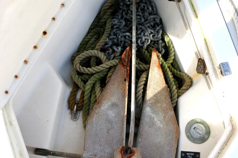 Slide: The Image of Anchor and ropes in a 1993 Hunter 33.5 sailboat. - 11