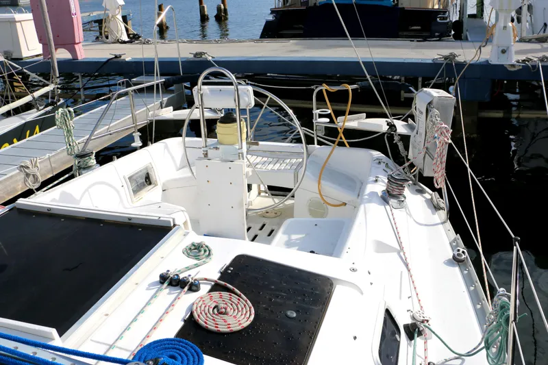 Slide: The Image of Cockpit of a 1993 Hunter 33.5 yacht docked at harbor. - 16