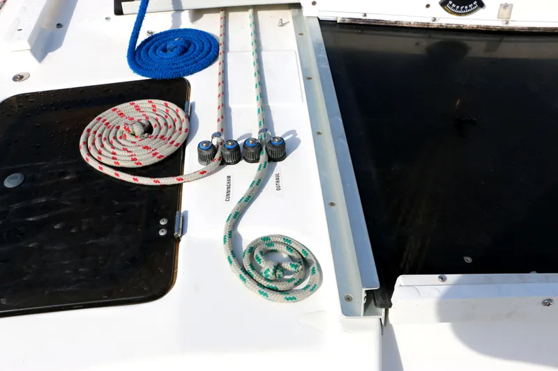 Slide: The Image of Deck of a 1993 Hunter 33.5 sailboat with ropes. - 17