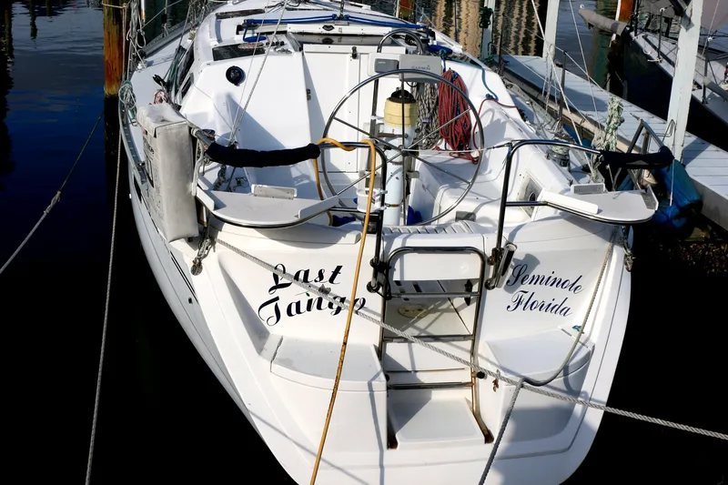 Slide: The Image of 1993 Hunter 33.5 sailboat docked, "Last Tango" from Seminole, Florida. - 2