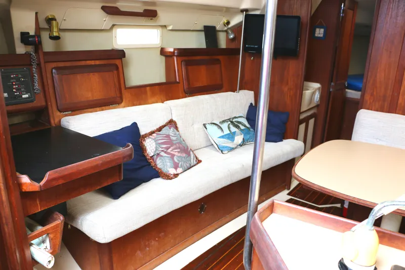 Slide: The Image of Interior of a 1993 Hunter 33.5 yacht with cozy sofa. - 22