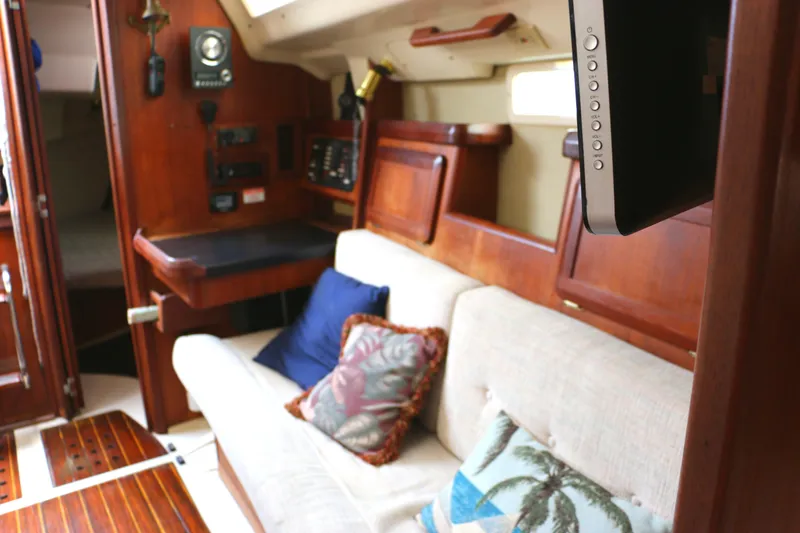 Slide: The Image of Interior of a 1993 Hunter 33.5 yacht with cozy sofa. - 23