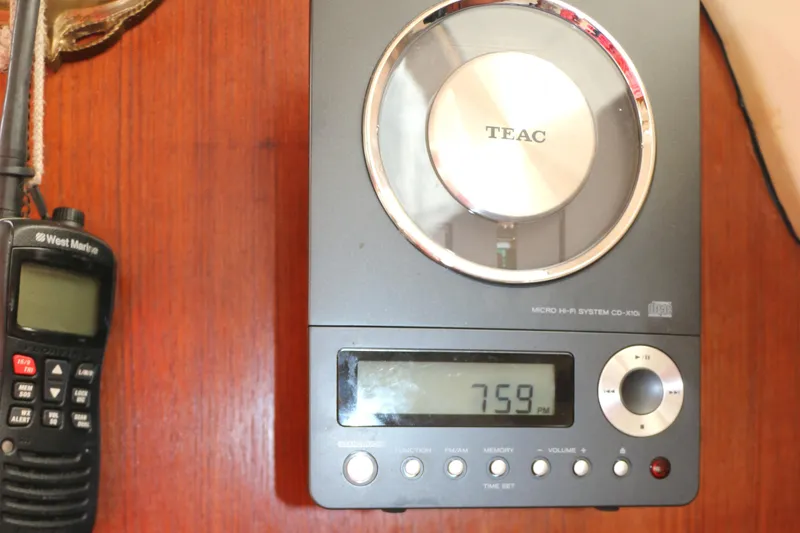 Slide: The Image of TEAC audio system and radio on wooden surface, Hunter 33.5, 1993. - 31