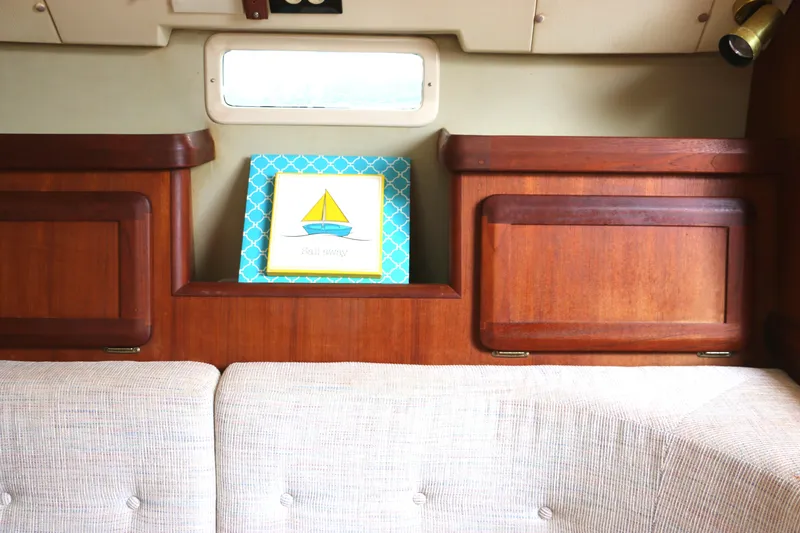 Slide: The Image of Interior of a 1993 Hunter 33.5 yacht with wooden cabinetry. - 35