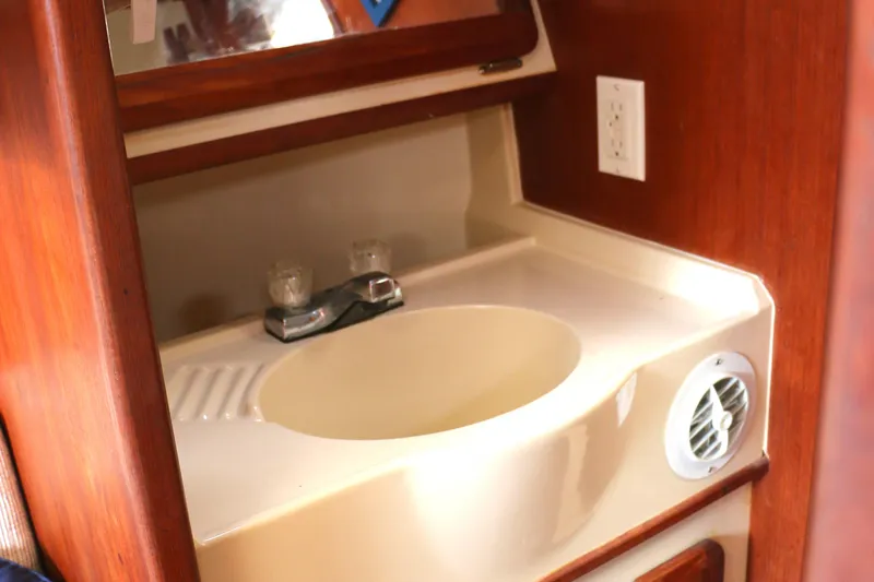 Slide: The Image of Bathroom sink in a 1993 Hunter 33.5 yacht. - 37