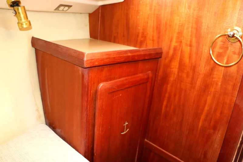 Slide: The Image of Interior of a 1993 Hunter 33.5 sailboat, wooden cabinetry. - 43