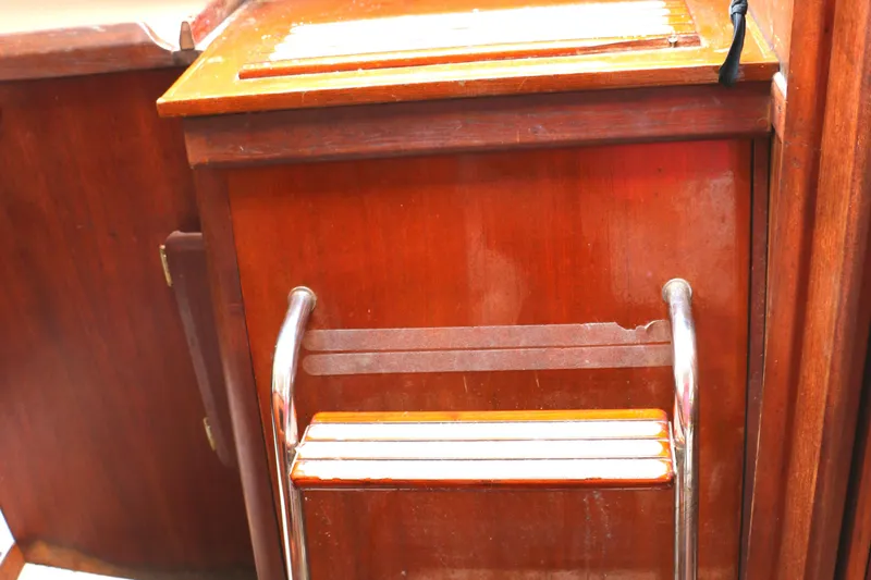 Slide: The Image of Wooden steps on a 1993 Hunter 33.5 sailboat. - 46