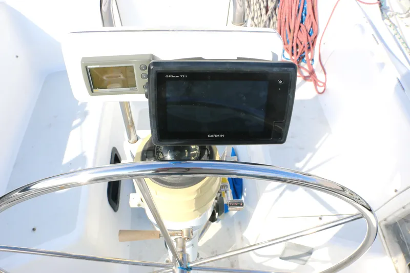 Slide: The Image of Steering wheel and navigation system on 1993 Hunter 33.5 sailboat. - 6