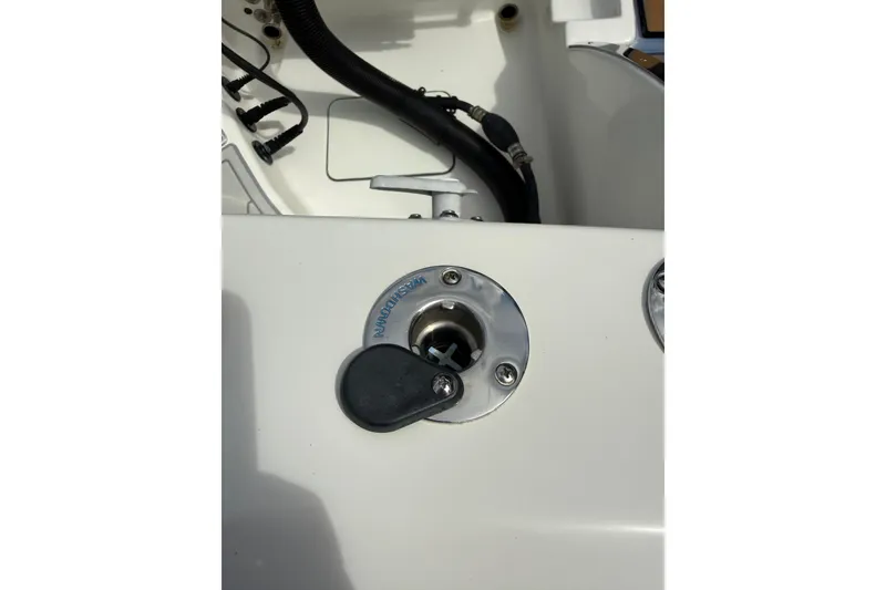 Slide: The Image of Fuel cap on a 2021 World Cat 280 CC-X boat deck. - 20