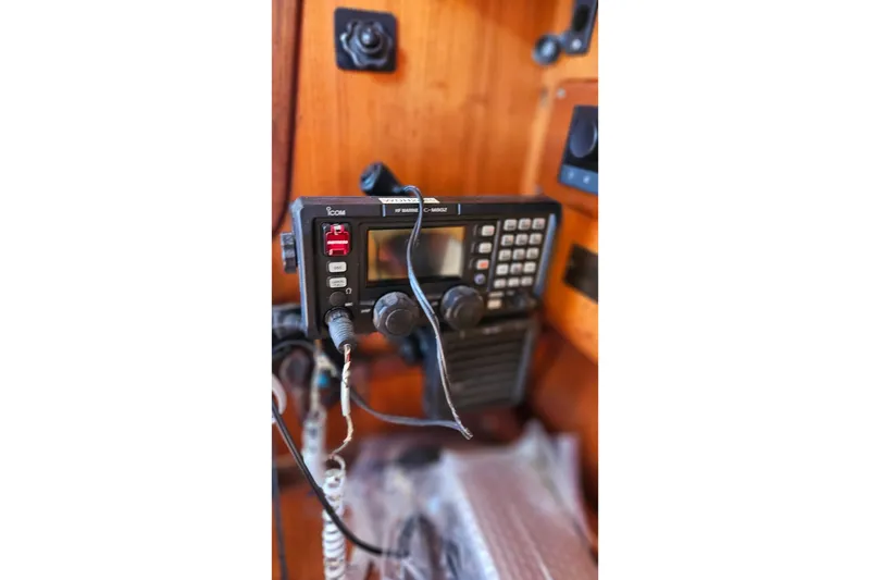 Slide: The Image of Marine radio equipment inside a 1989 Gib'Sea 37 sailboat cabin. - 22