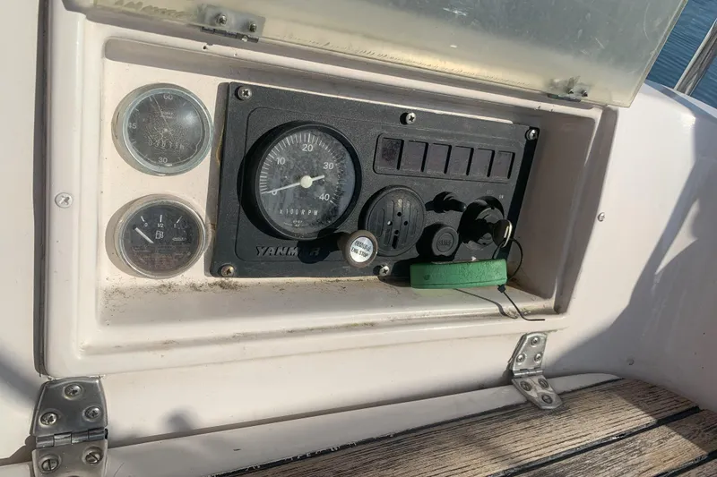 Slide: The Image of Control panel of a 1989 Gib'Sea 37 sailboat with gauges and switches. - 37
