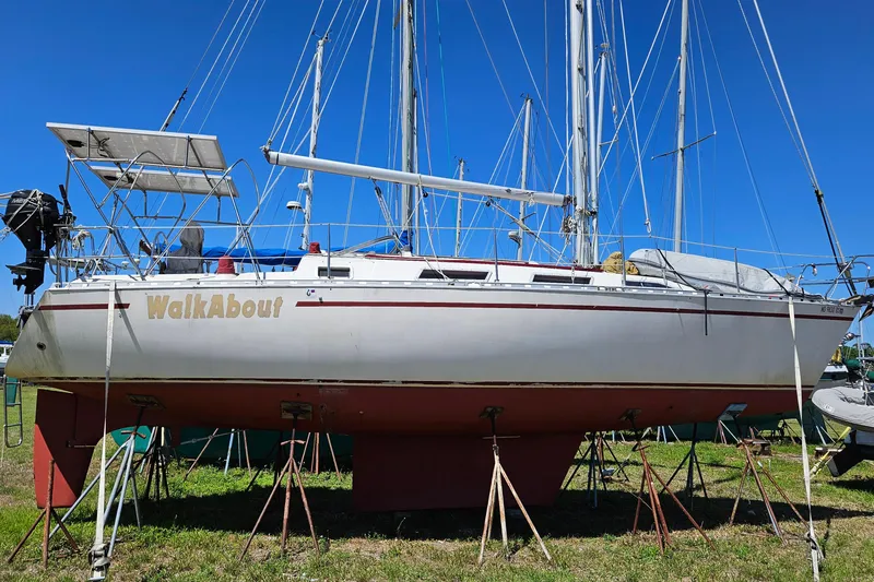 Slide: The Image of 1989 Gib'Sea 37 sailboat "WalkAbout" on stands, clear blue sky background. - 5