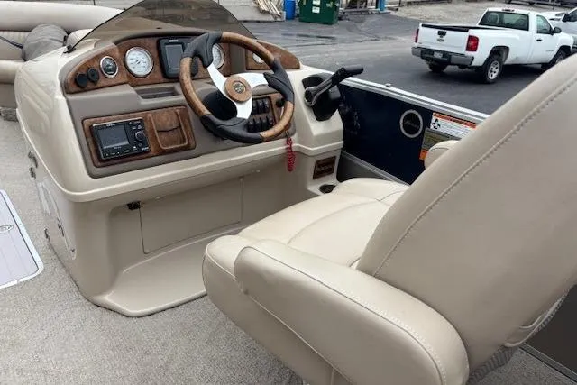 Slide: The Image of Captain's seat and helm of 2011 Berkshire 243 SLX pontoon boat. - 7