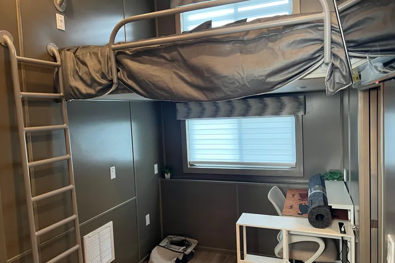 Slide: The Image of Compact room with loft bed, desk, and window in Sumerset Luxe II, 2026 model. - 15