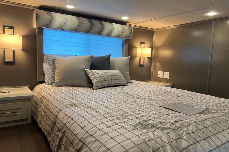 Slide: The Image of Luxurious bedroom interior in 2026 Sumerset Luxe II houseboat, featuring elegant lighting and modern decor. - 20