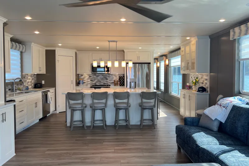 Slide: The Image of Luxurious Sumerset Luxe II 2026 houseboat kitchen with modern design and lake view. - 3