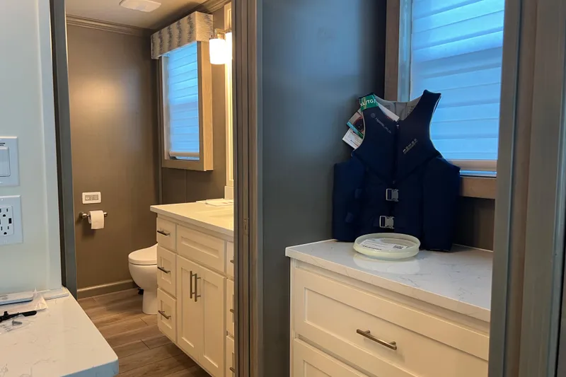 Slide: The Image of Modern bathroom in 2026 Sumerset Luxe II houseboat with life jacket and elegant fixtures. - 30