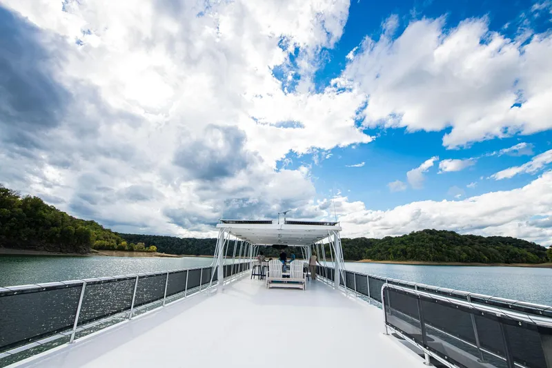 Slide: The Image of Luxurious Sumerset Luxe II houseboat cruising on a scenic lake under a vibrant sky, 2026 model. - 39