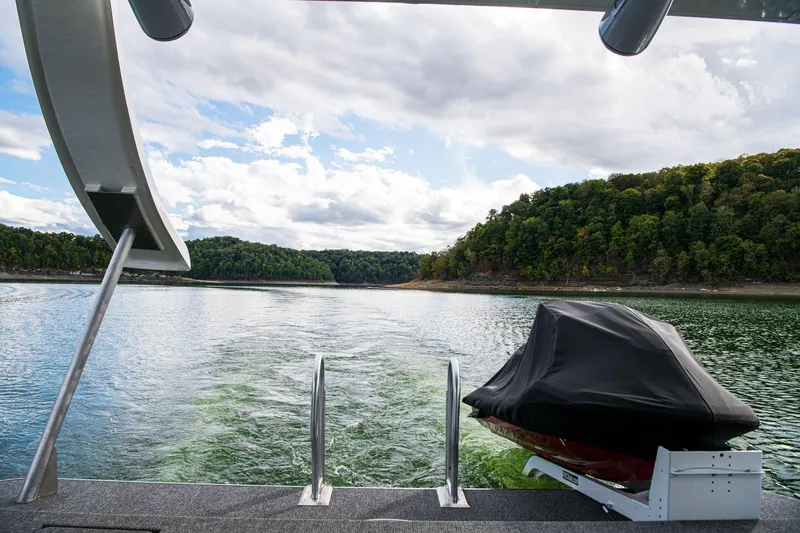 Slide: The Image of Rear view from Sumerset Luxe II houseboat, 2026 model, cruising on a scenic lake. - 42