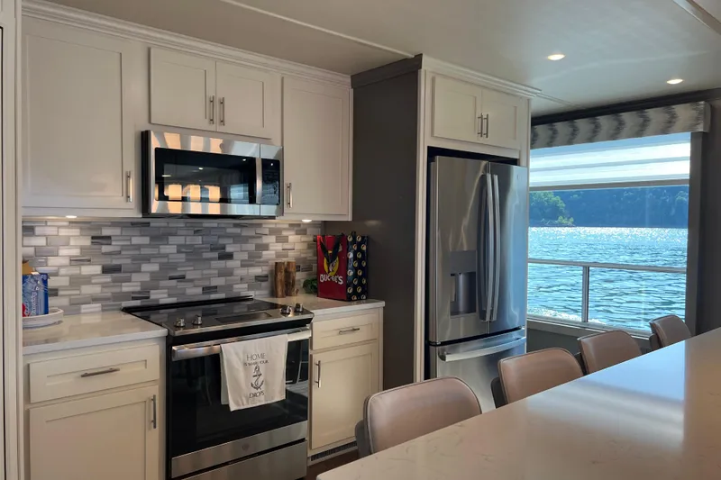 Slide: The Image of Modern kitchen in 2026 Sumerset Luxe II houseboat with lake view. - 8