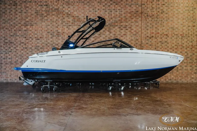 The Image of 2025 Cobalt R4 boat displayed indoors at Lake Norman Marina. - 1