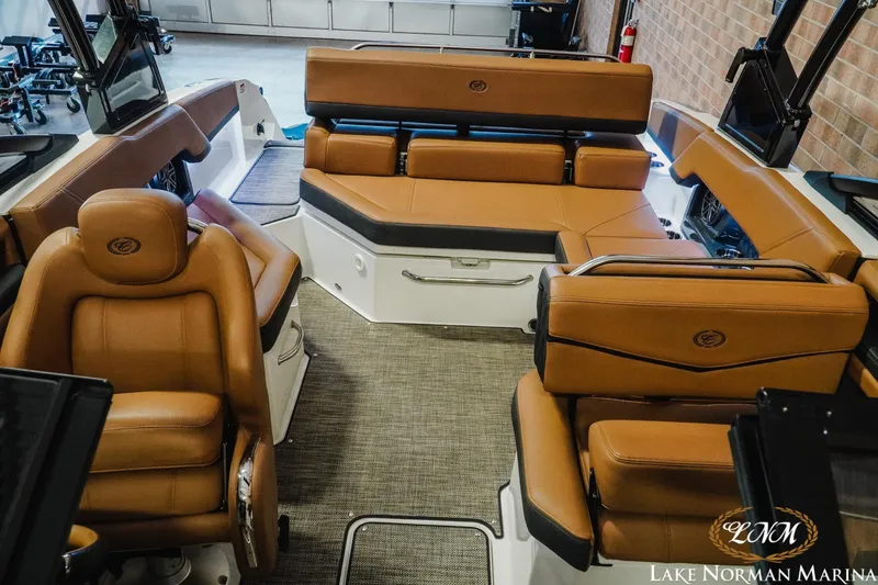 Slide: The Image of Luxurious interior of 2025 Cobalt R4 boat with tan leather seating at Lake Norman Marina. - 16