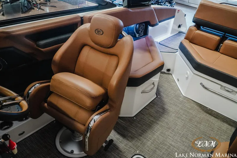 Slide: The Image of Luxurious interior of 2025 Cobalt R4 boat with plush brown seating. - 18