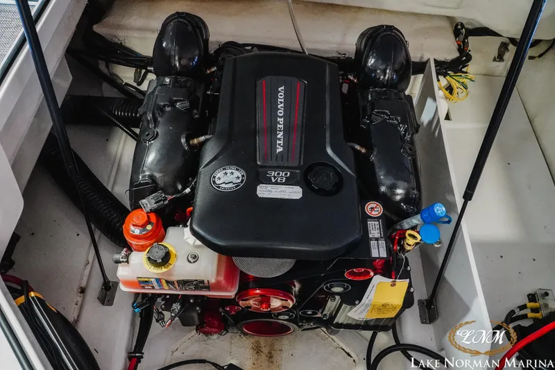 Slide: The Image of Engine compartment of a 2025 Cobalt R4 boat featuring a Volvo Penta 300 V8 engine. - 20
