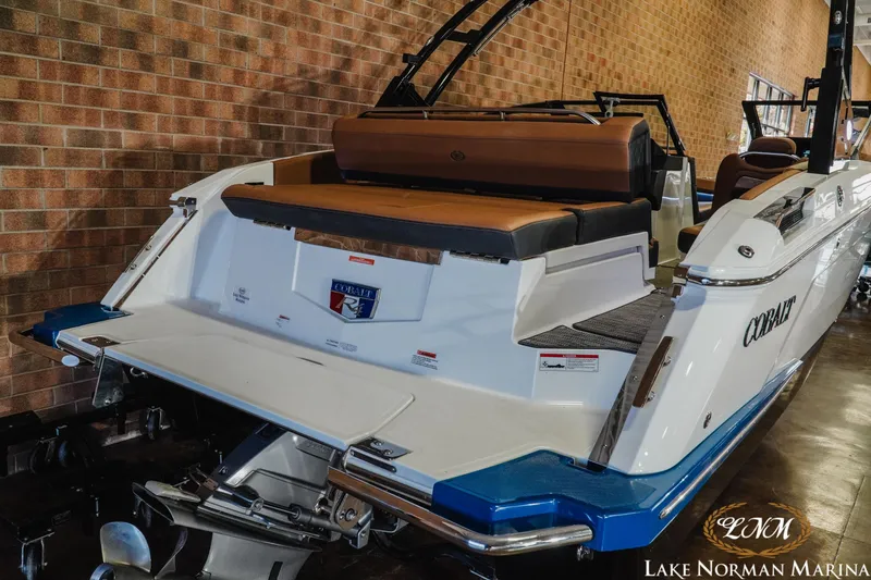 Slide: The Image of 2025 Cobalt R4 boat at Lake Norman Marina, featuring sleek design and comfortable seating. - 7