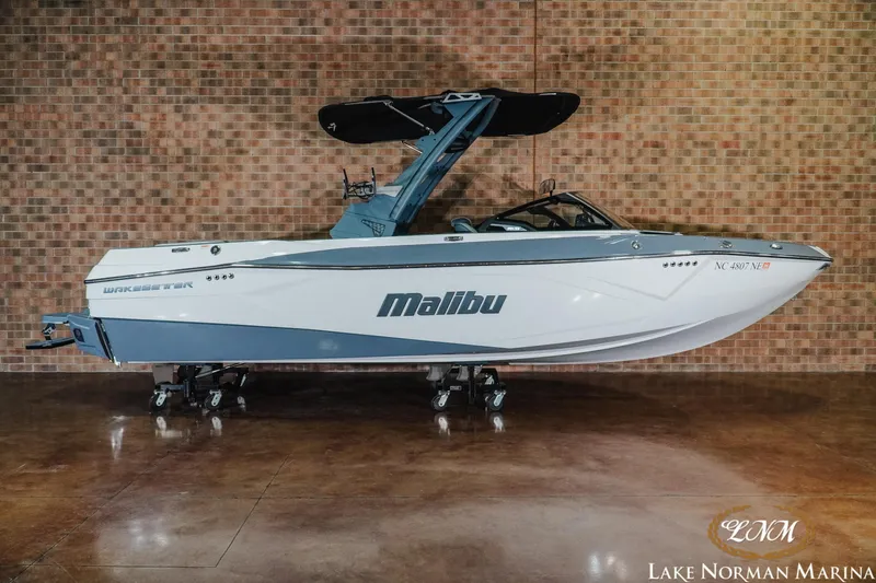 The Image of 2025 Malibu Wakesetter 23 LSV boat displayed indoors at Lake Norman Marina. - 1