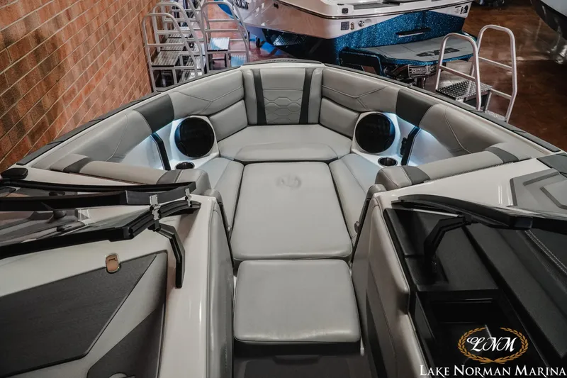 Slide: The Image of 2025 Malibu Wakesetter 23 LSV interior with luxurious seating at Lake Norman Marina. - 14