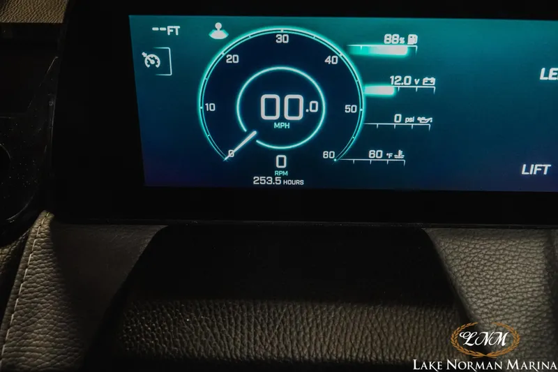 Slide: The Image of Dashboard display of 2025 Malibu Wakesetter 23 LSV showing speed, battery, and engine metrics. - 17