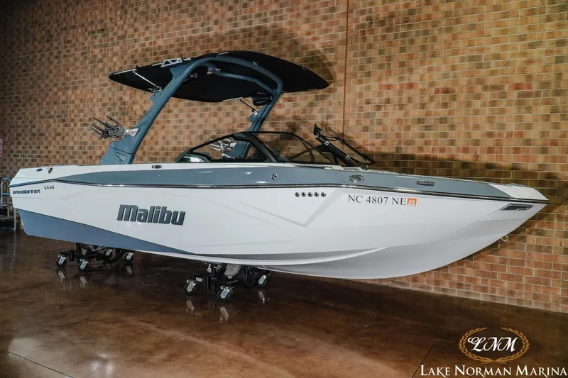 Slide: The Image of 2025 Malibu Wakesetter 23 LSV boat displayed indoors at Lake Norman Marina. - 3
